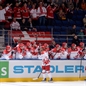 MINSK, BELARUS - MAY 13: Denmark's Jesper Jensen #40 high fives the bench after scoring Team Denmark's first goal of the game during preliminary round action at the 2014 IIHF Ice Hockey World Championship. (Photo by Richard Wolowicz/HHOF-IIHF Images)